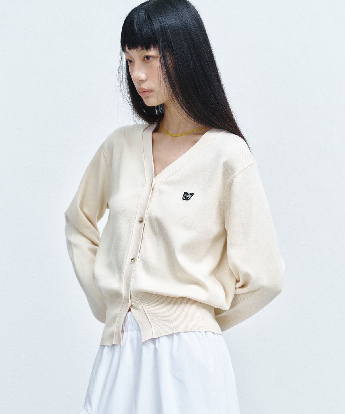 닉앤니콜(NICK&NICOLE) BUTTERFLY PATCH V-NECK CARDIGAN_LIGHT BEIGE