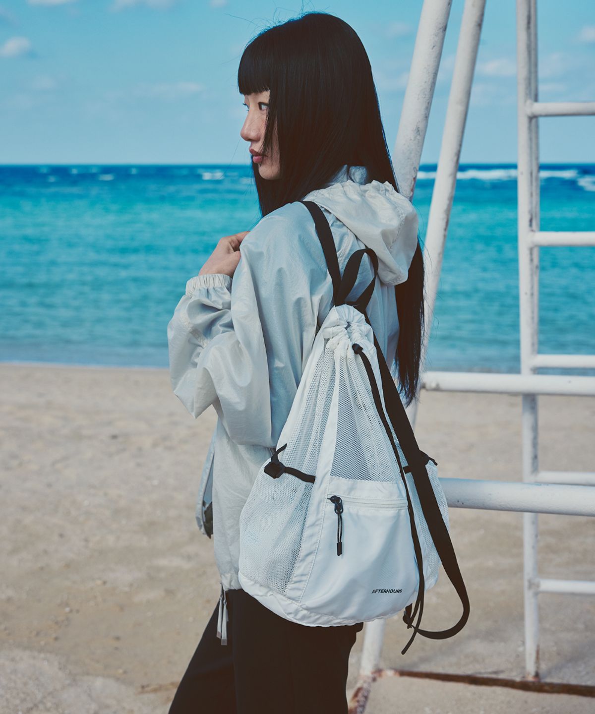 애프터아워즈(AFTERHOURS) DRAWSTRING LIGHT MESH BACKPACK (WHITE)