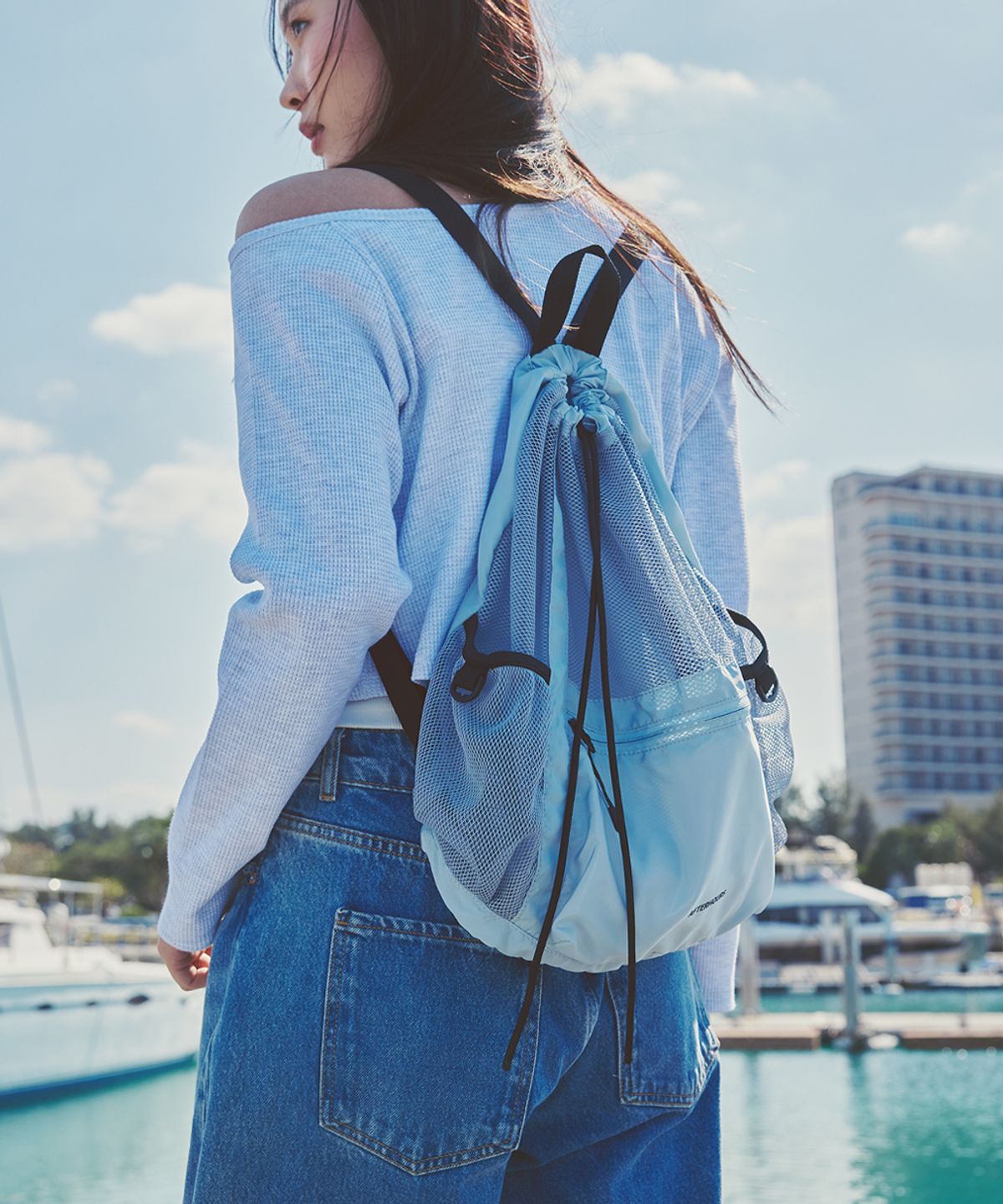 애프터아워즈(AFTERHOURS) DRAWSTRING LIGHT MESH BACKPACK (SKY BLUE)