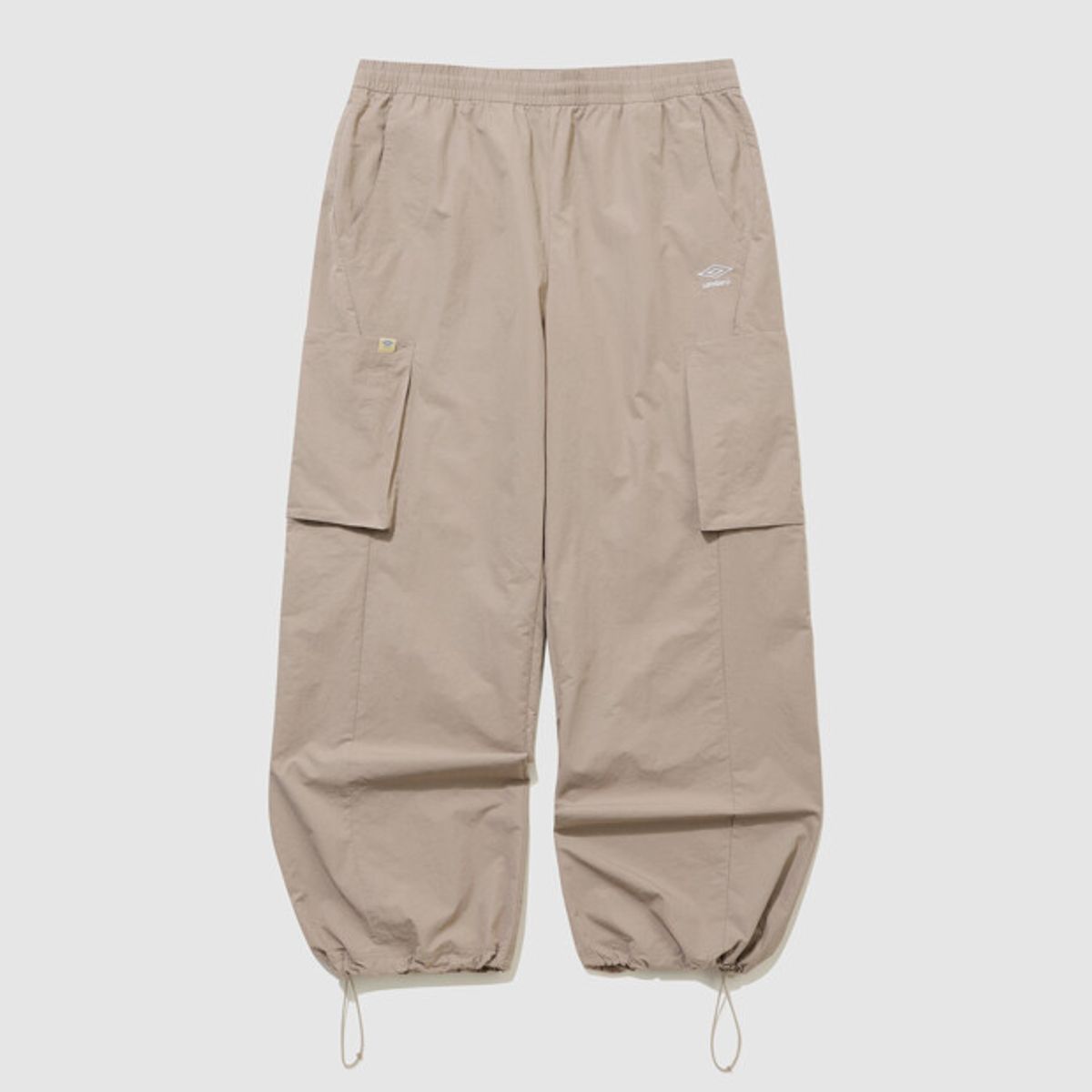 엄브로(UMBRO) 하이웨이 와이드 조거 2WAY 카고 팬츠 베이지 UR221CPT41