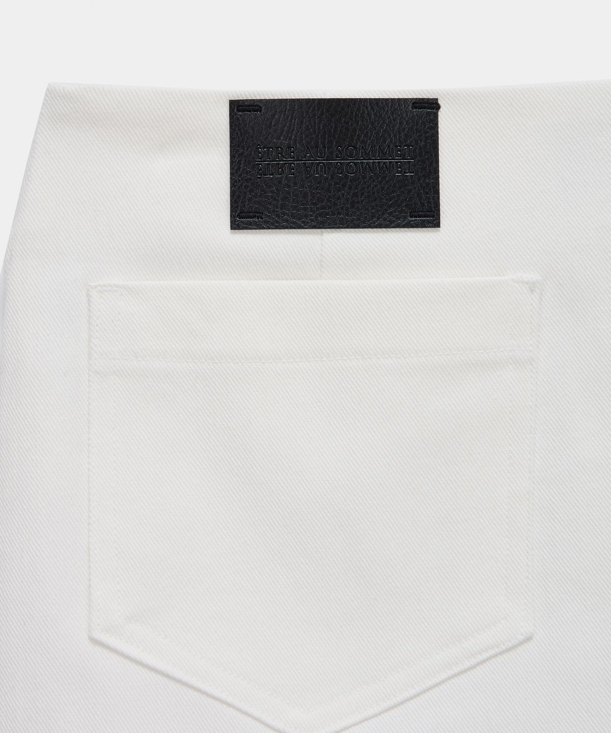 에트오소메(ETRE AU SOMMET) Front Zipper Belt Detail Mini Skirt (White)