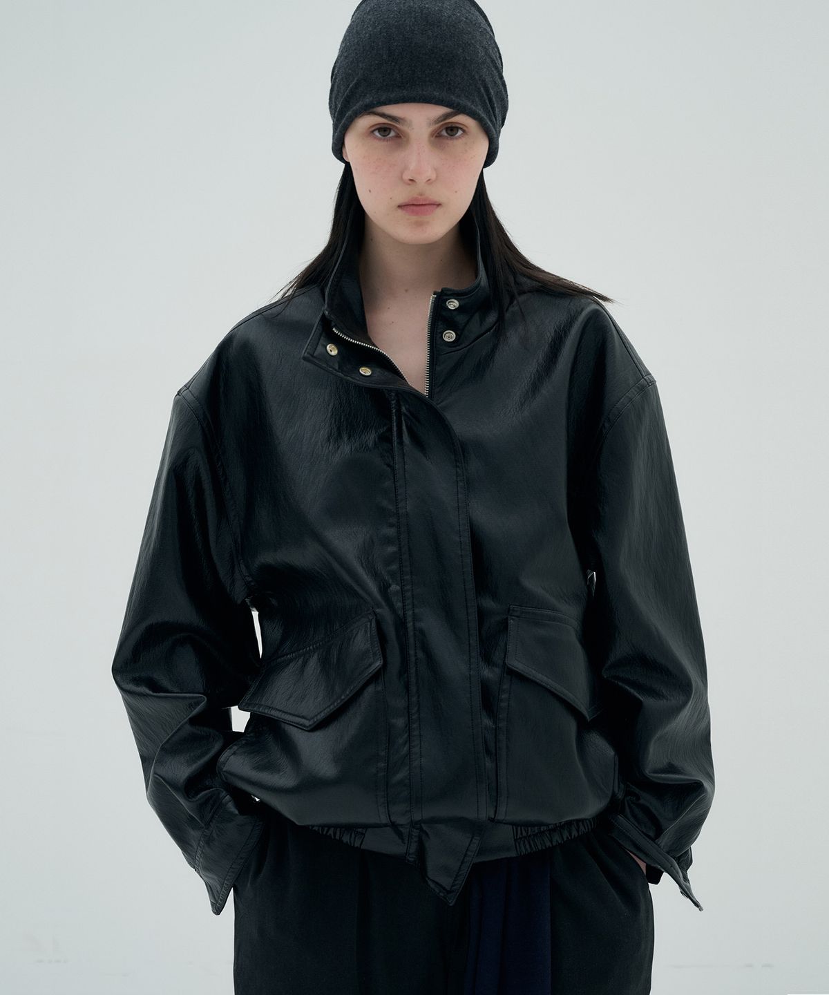 정감 스튜디오(JEONGGAM STUDIOS) High-Neck Faux Leather Jumper_2 color
