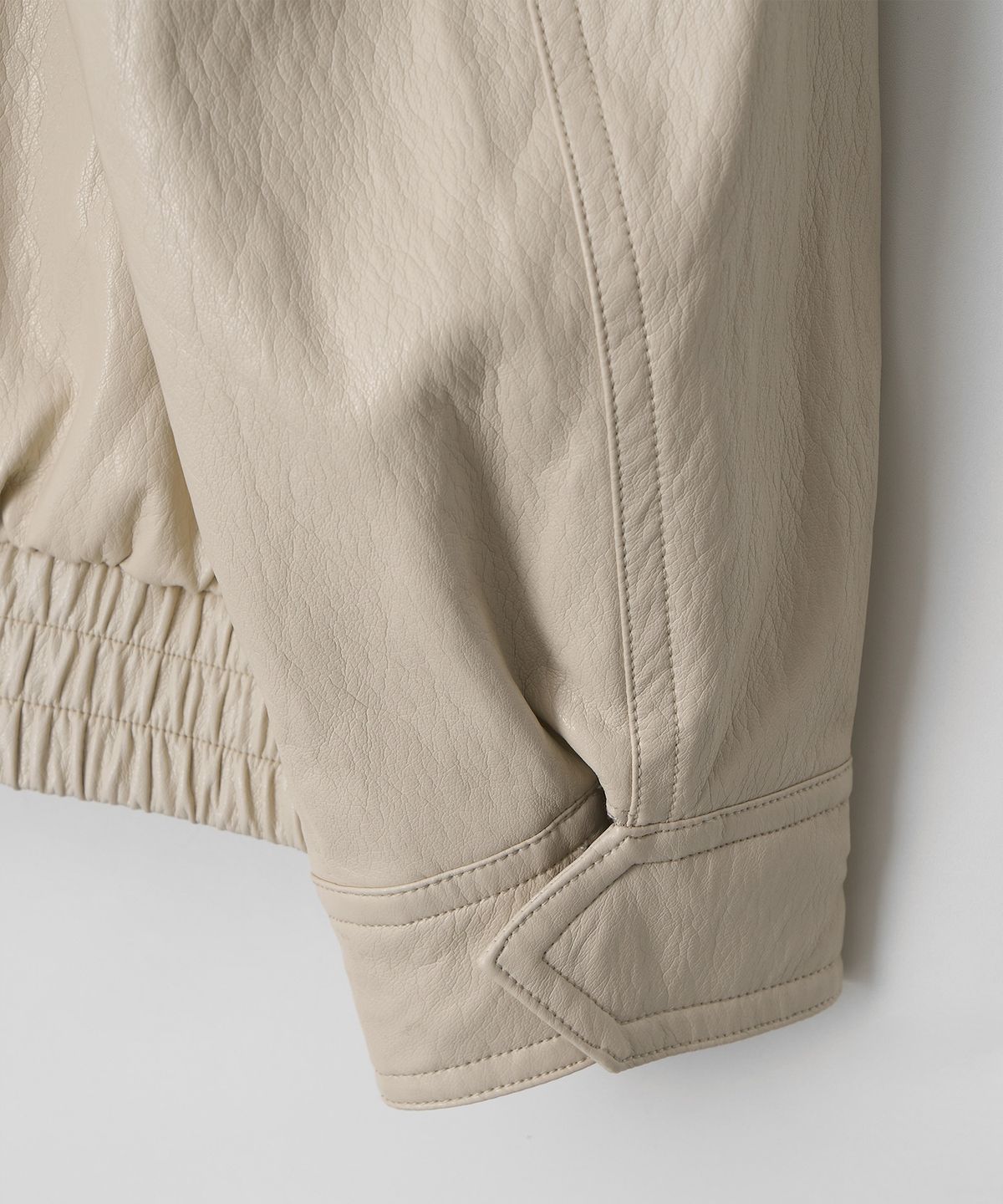 정감 스튜디오(JEONGGAM STUDIOS) High-Neck Faux Leather Jumper_2 color