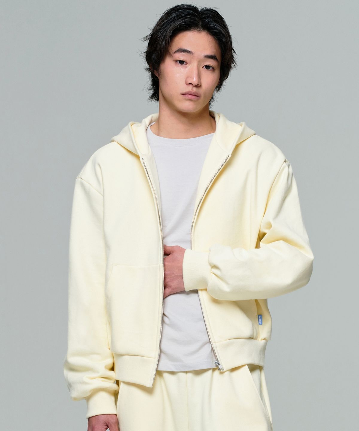 이알에이(ERA) UNISEX ERA OVERSIZED HOODED ZIP-UP - LEMON CREAM