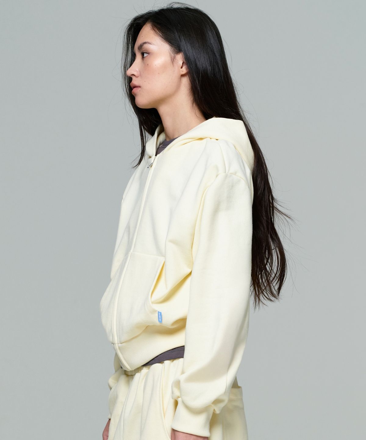 이알에이(ERA) UNISEX ERA OVERSIZED HOODED ZIP-UP - LEMON CREAM