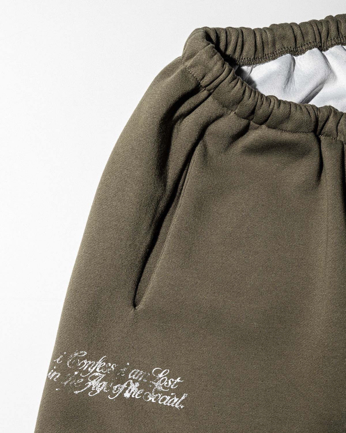 펀치드렁크파티즈(PUNCH DRUNK PARTIES) PARTIER Dirt Sweatpants (KHAKI)
