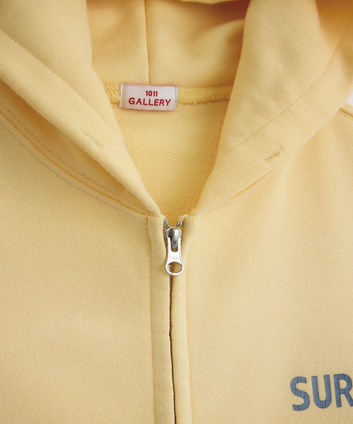 1011갤러리(1011 GALLERY) Faded Surfer Logo Hoodie Zip-Up - Washed Yellow