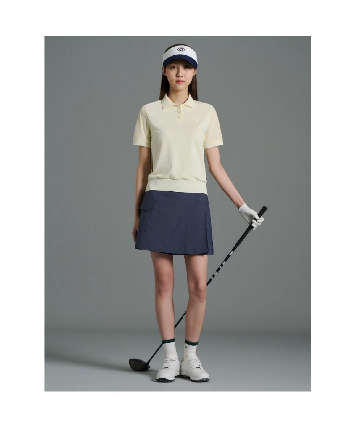 빈폴골프(BEANPOLE GOLF) 여성 로고 타공 칼라 반소매 티셔츠 - 레몬