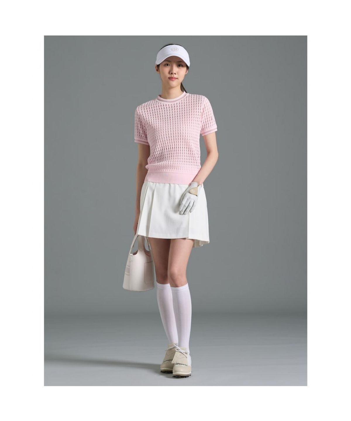 빈폴골프(BEANPOLE GOLF) 여성 변형 케이블 반소매 풀오버 - 라이트 핑크