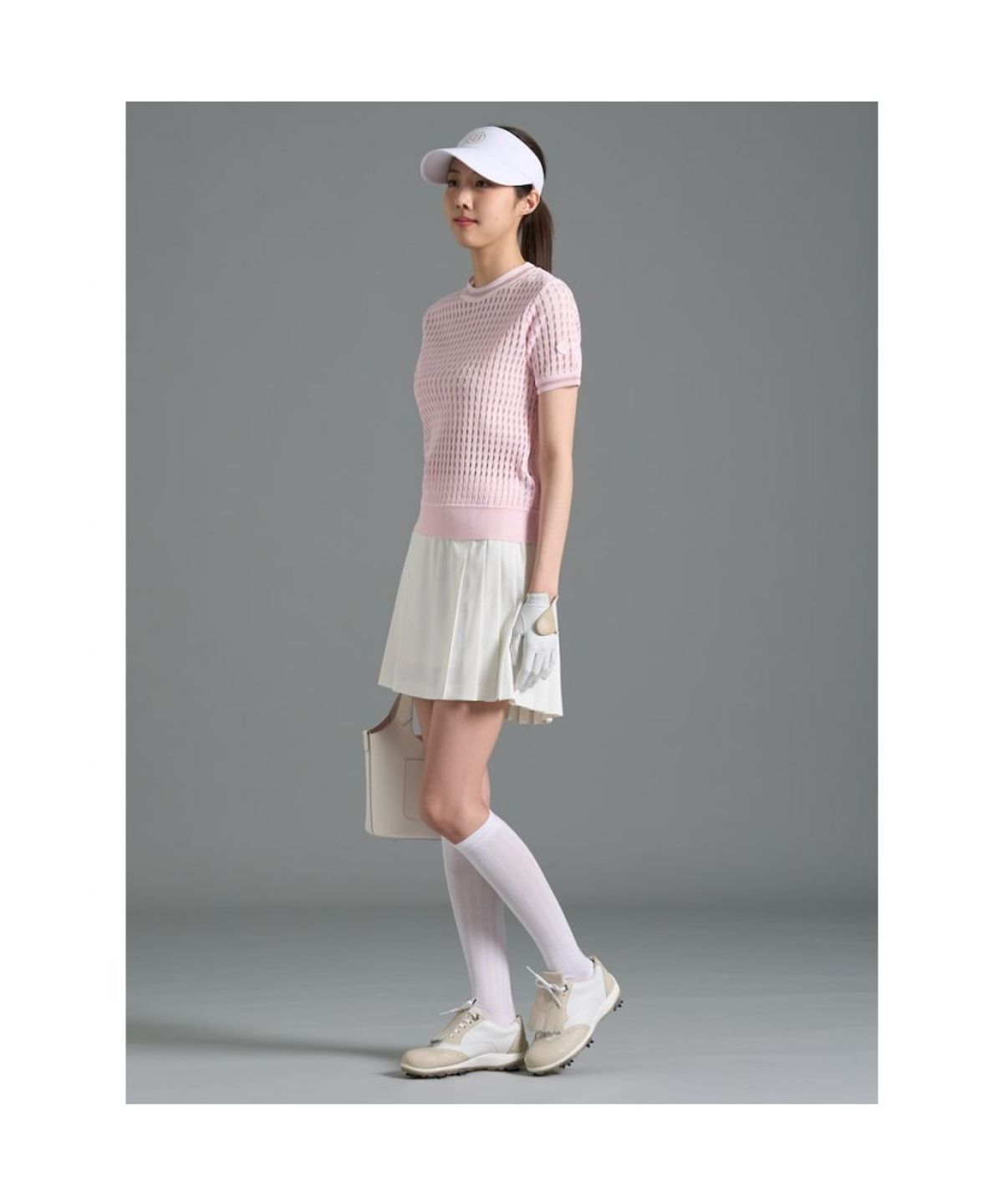 빈폴골프(BEANPOLE GOLF) 여성 변형 케이블 반소매 풀오버 - 라이트 핑크