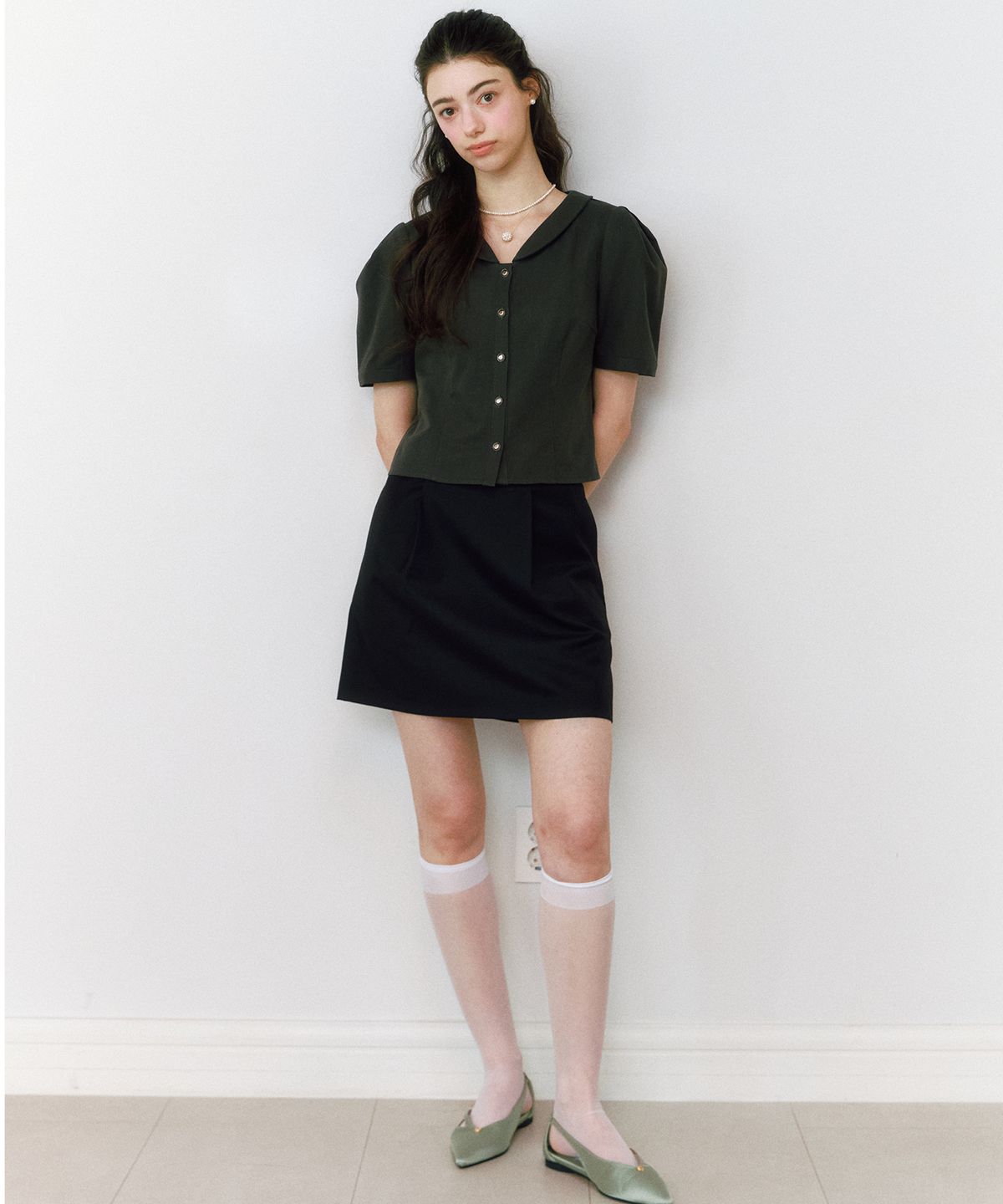네임카테고리(NAME CATEGORY) 메이브 A라인 핀턱 스커트_블랙