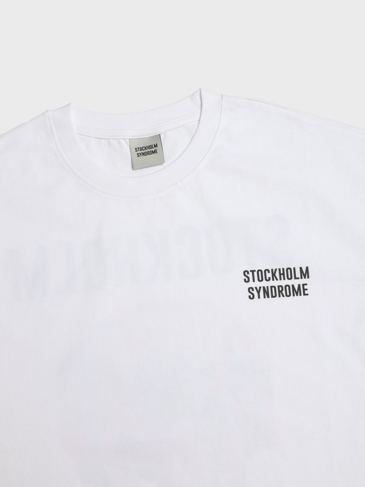 스톡홀름 신드롬(STOCKHOLM SYNDROME) 스톡홀름신드롬 스컬 티 - 화이트