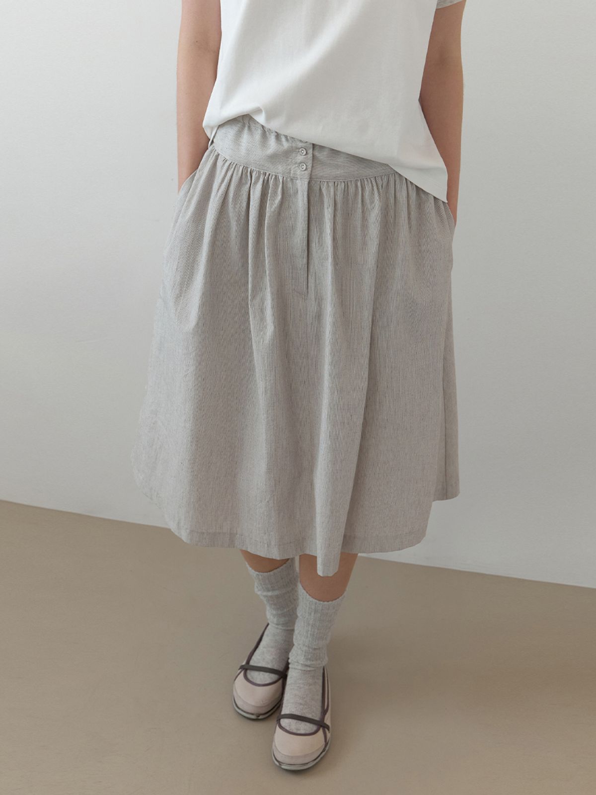 더미튼(THEMITTEN) [4th] Horn button skirt (oat stripe)
