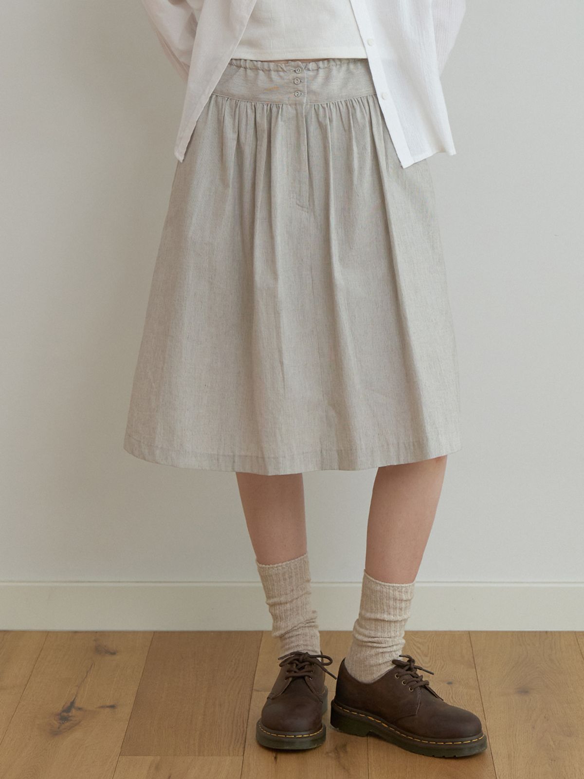 더미튼(THEMITTEN) [4th] Horn button skirt (oat stripe)