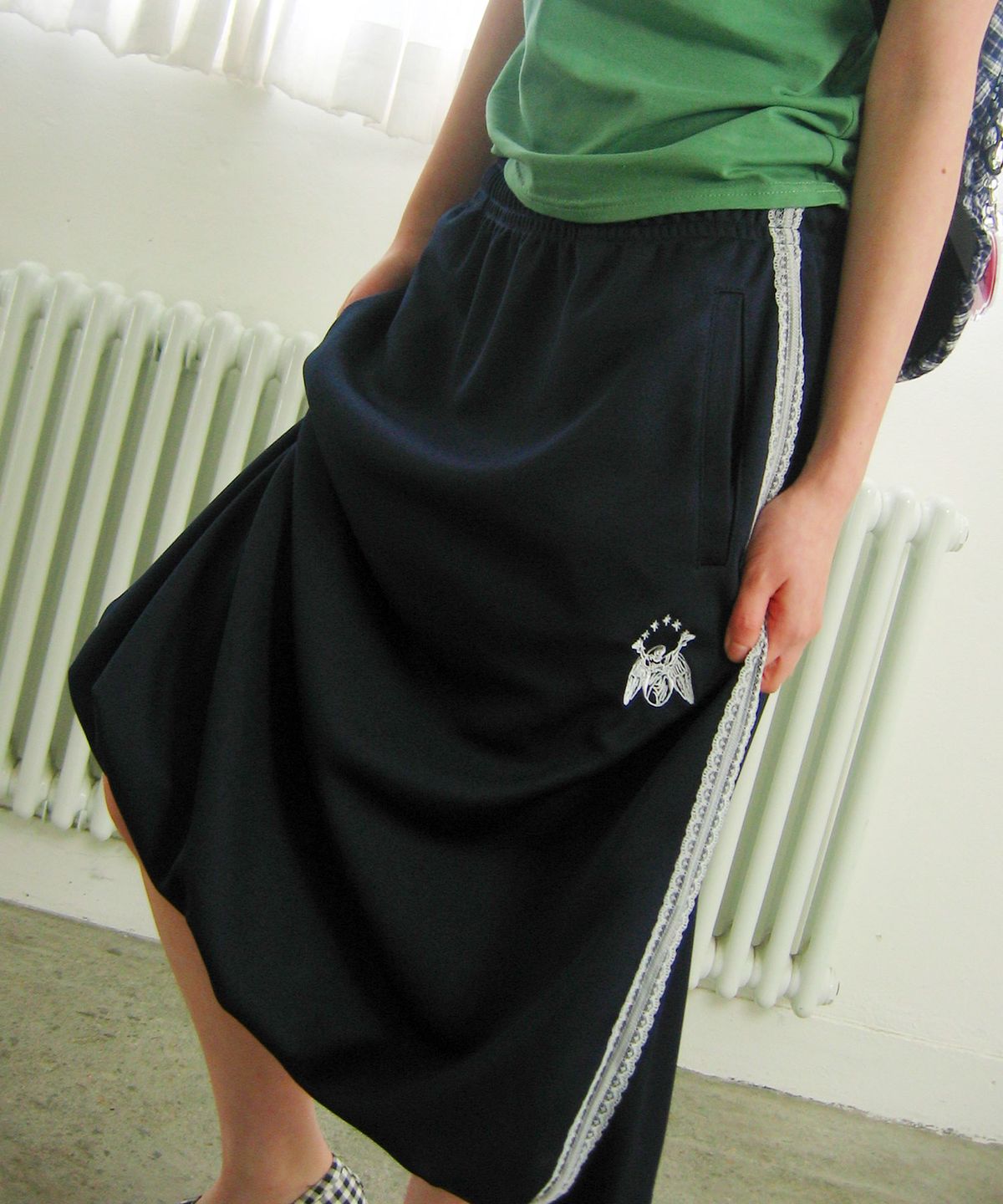 나이스고스트클럽(NICEGHOSTCLUB) GLORY BALLOON LACE TRACK JERSEY SKIRT_NAVY(NG2GMFPA90A)