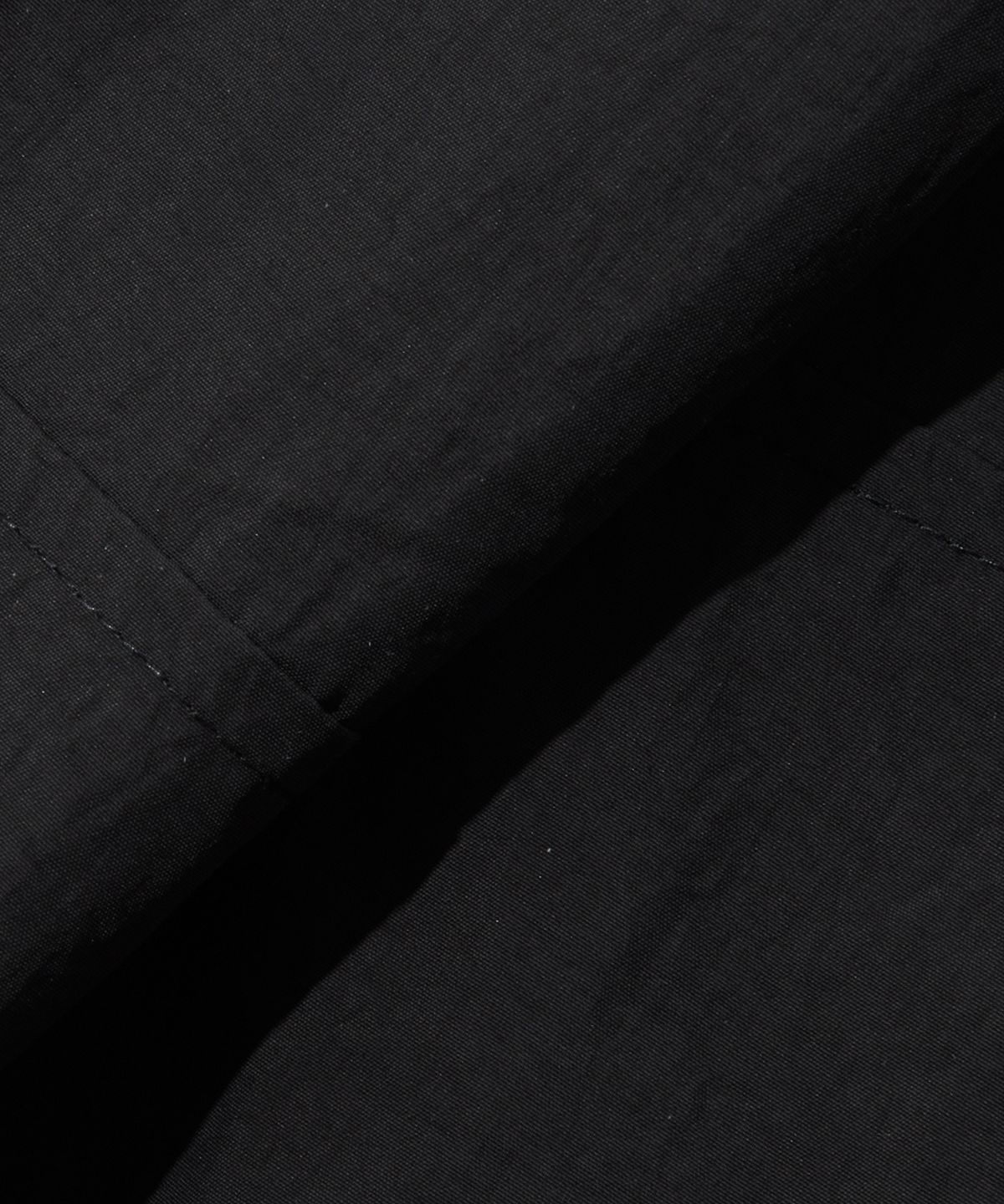 리복(REEBOK) 나일론 카고 버뮤다 쇼츠 - 블랙
