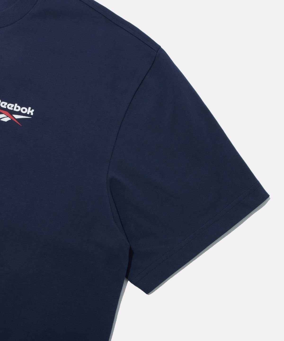 리복(REEBOK) 멀티로고 오버핏 반팔티 - 네이비