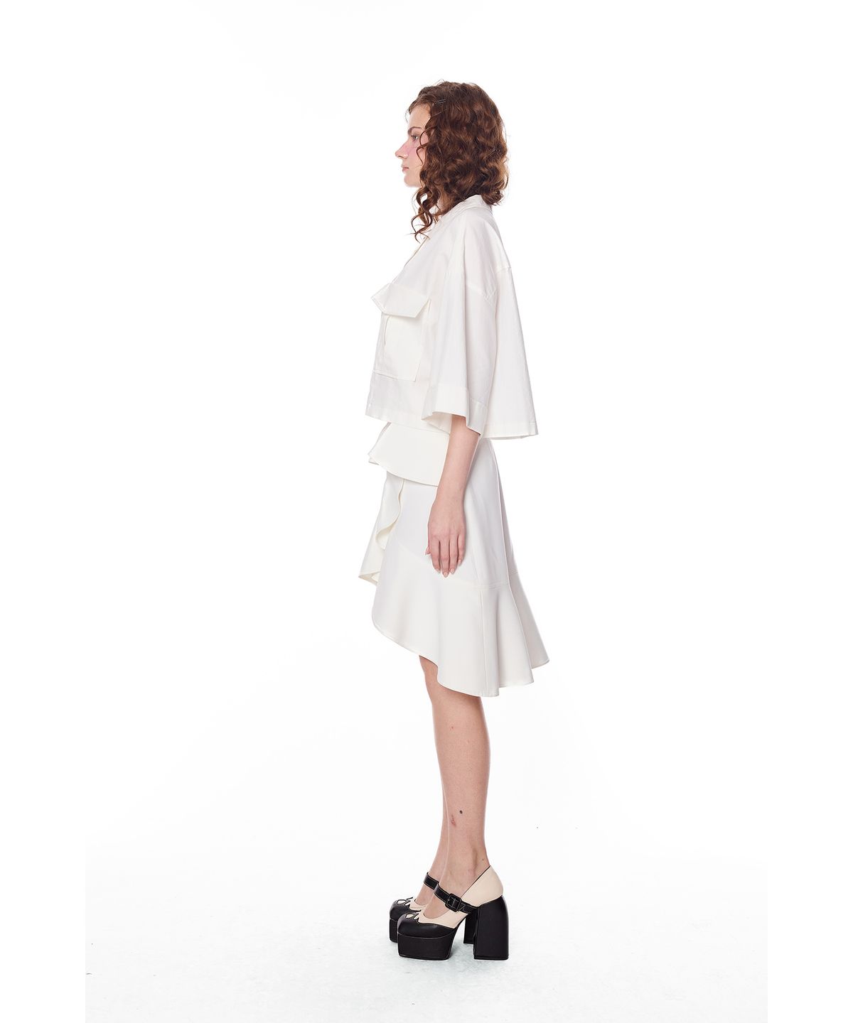 그리디어스(GREEDILOUS) Assymetric Curved Ruffle overlay Skirt