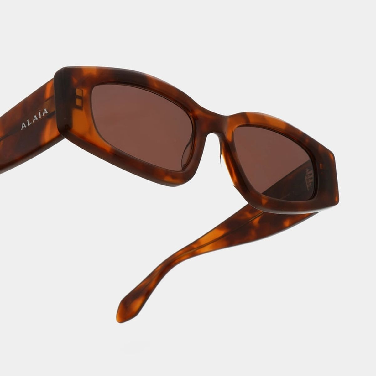 알라이아 아이웨어(ALAIA EYEWEAR) AA0079S 002
