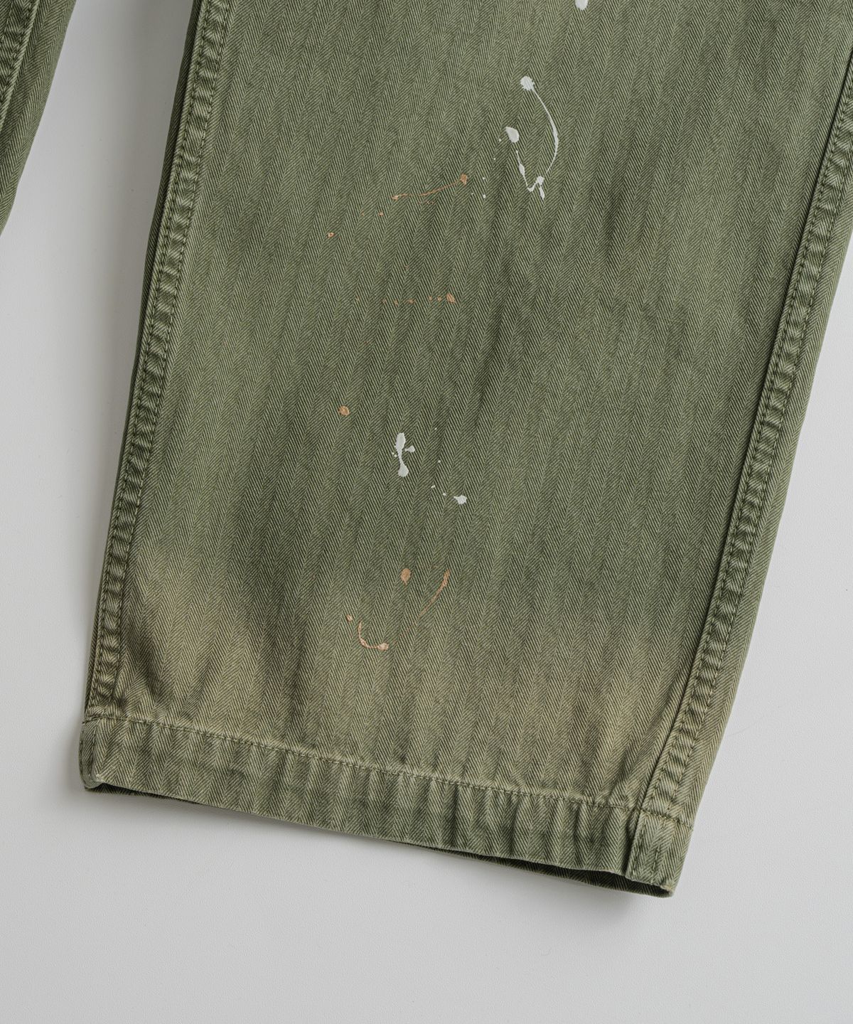 비헤비어(BEHEAVYER) USED HEMMED MIL PANTS olive drab