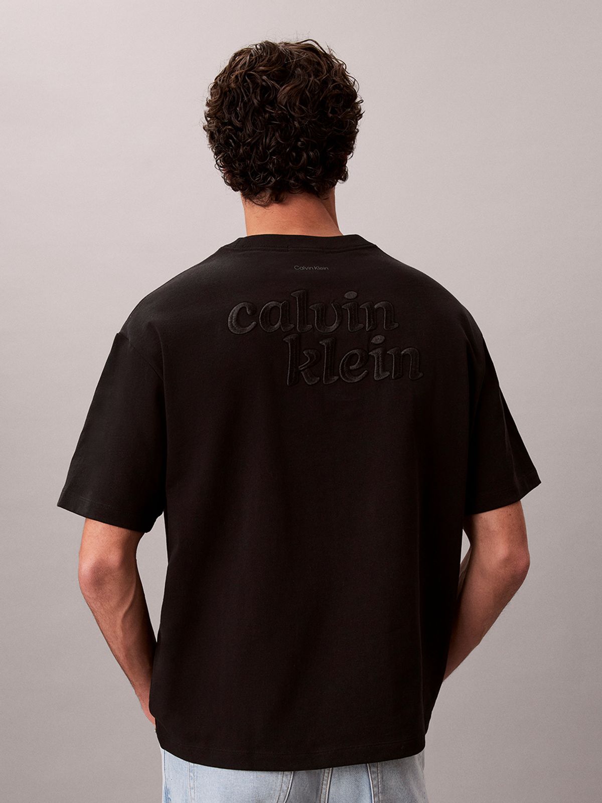캘빈클라인 진(CALVIN KLEIN JEANS) 헤비 오픈엔드 저지 그래픽 티 4RG248G UB1