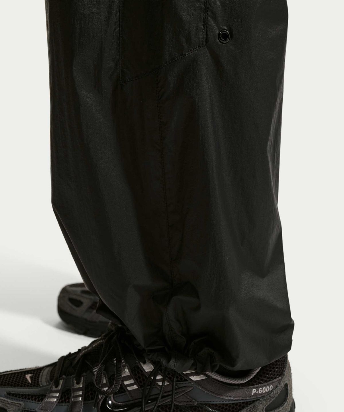 나이키(NIKE) 윈드러너 경량 UV 팬츠 M - 블랙:화이트 / IQ0922-010