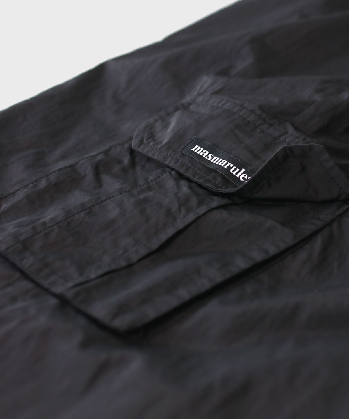 마스마룰즈 어패럴(MASMARULEZ APPAREL) Essential Parasuit Shirring Cargo Pants_Black