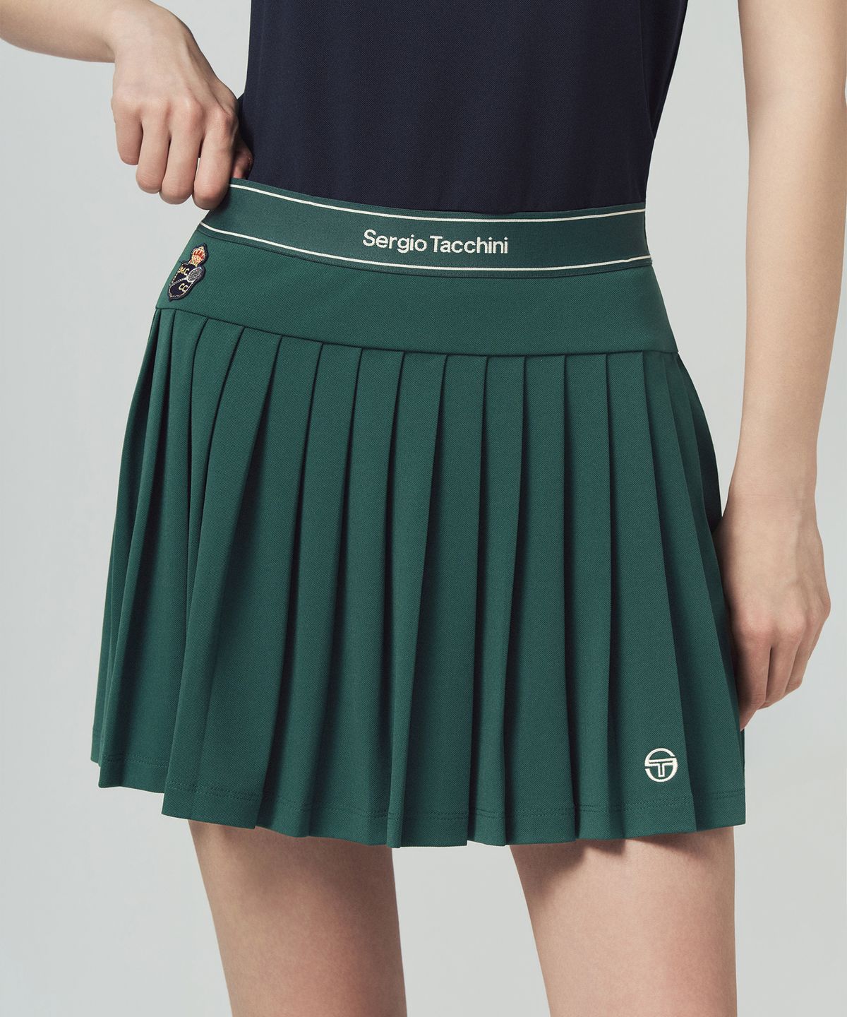 세르지오 타키니(SERGIO TACCHINI) W MC 스크래치 스태프 플리츠 스커트 (D.Green)