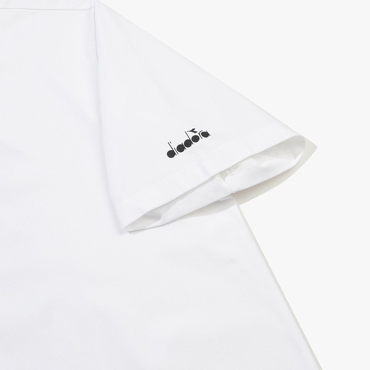 디아도라(diadora) 에어텍스 볼 버디 반팔 티셔츠 OFF WHITE