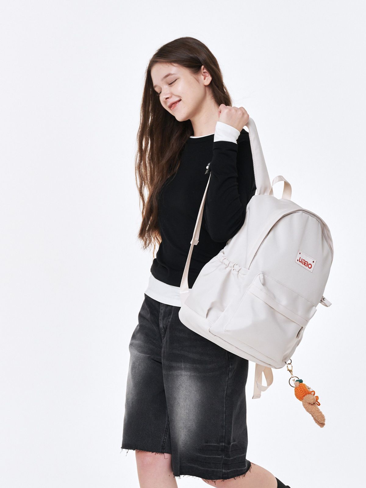 우아오(UAAO) 데일루 클래식 키링 디테일 데일리백팩 (Ivory)