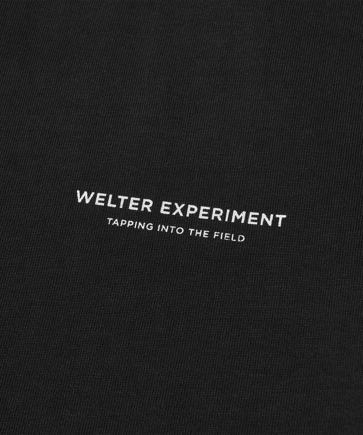 웰터 익스페리먼트(WELTER EXPERIMENT) NAZCA VERTICAL SYMBOL T-SHIRT_BLACK