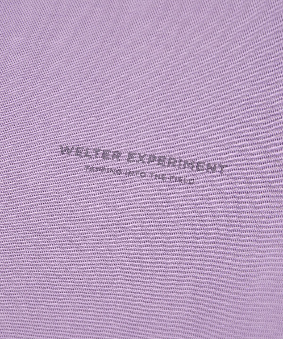 웰터 익스페리먼트(WELTER EXPERIMENT) NAZCA VERTICAL SYMBOL T-SHIRT_LAVENDER
