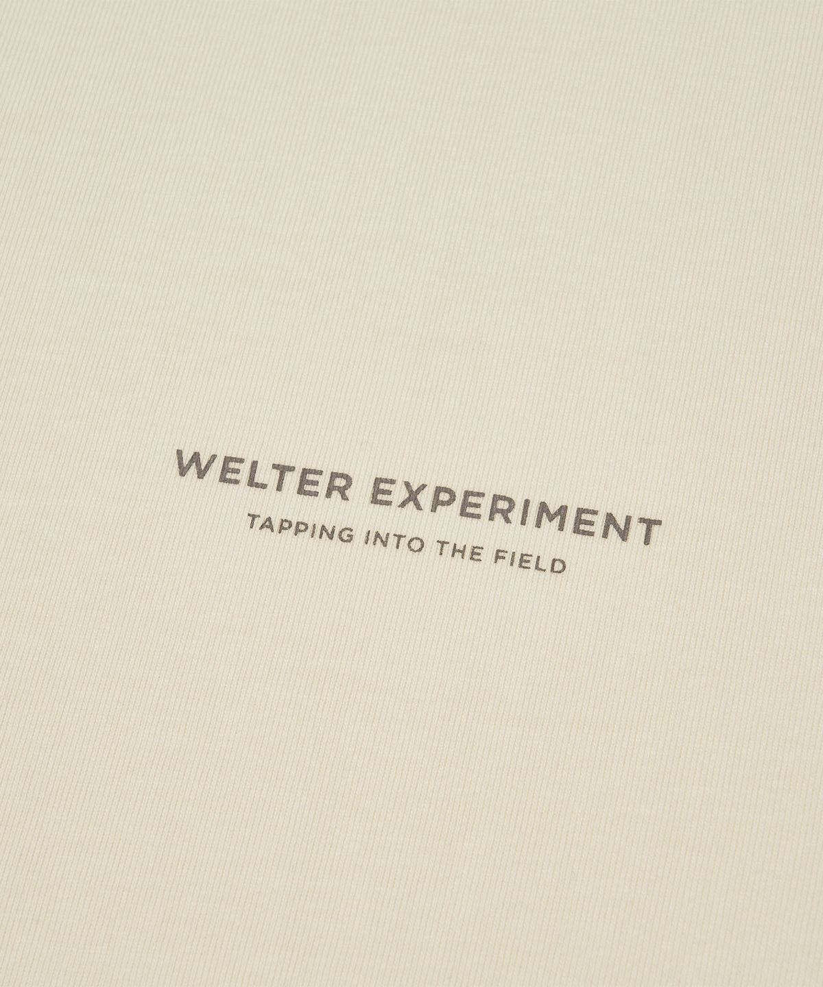 웰터 익스페리먼트(WELTER EXPERIMENT) NAZCA VERTICAL SYMBOL T-SHIRT_CREAM