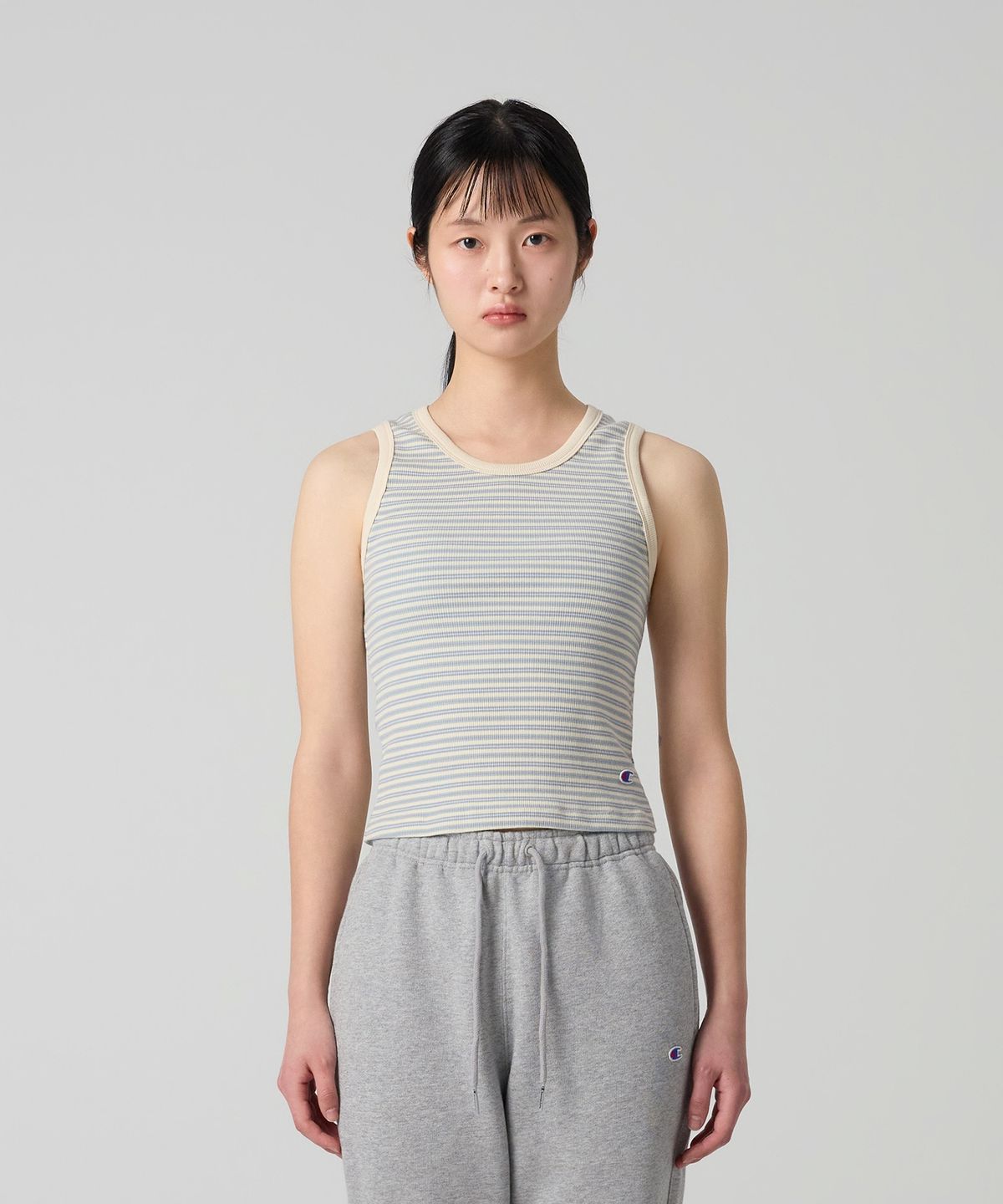 챔피온(CHAMPION) 여성 C로고 스트라이프 슬리브리스 Light Blue