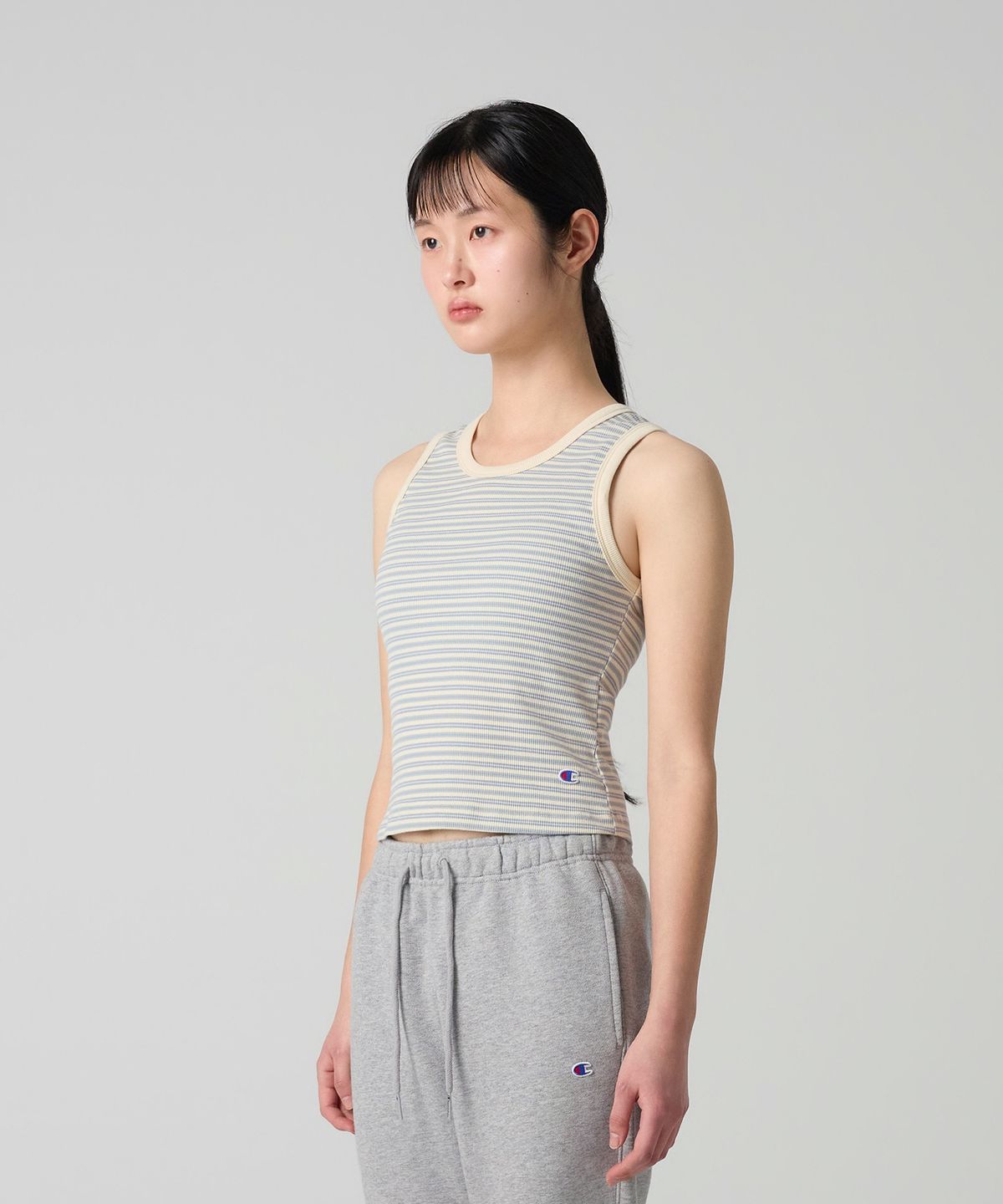 챔피온(CHAMPION) 여성 C로고 스트라이프 슬리브리스 Light Blue