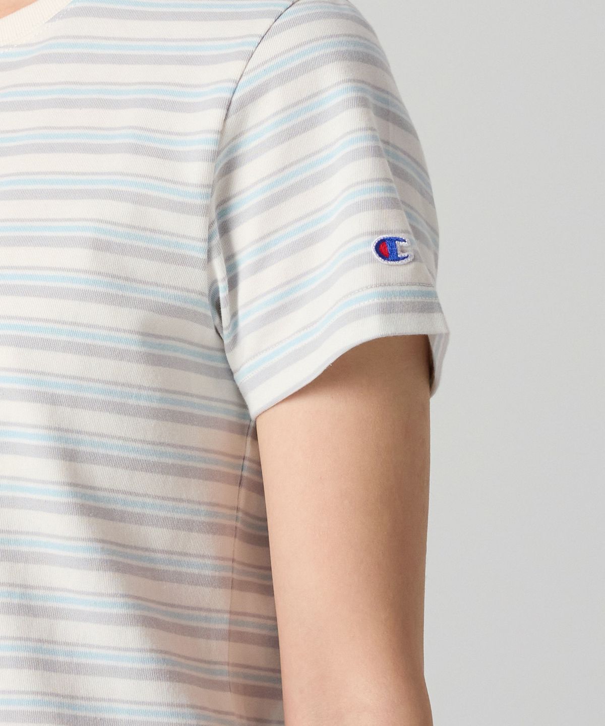 챔피온(CHAMPION) 여성 C로고 스트라이프 티셔츠 Ecru