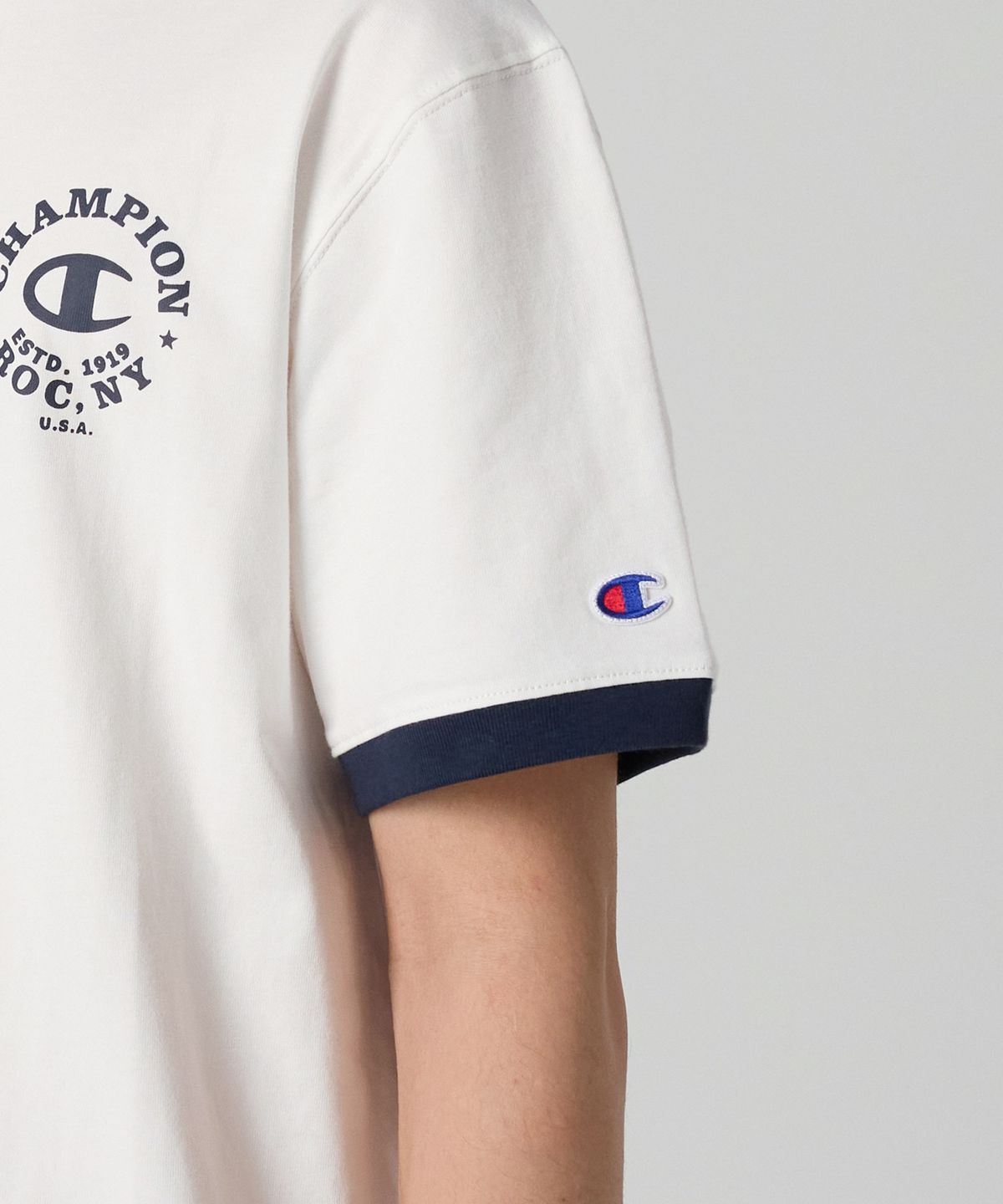 챔피온(CHAMPION) 그래픽 프린트 링거 티셔츠 White