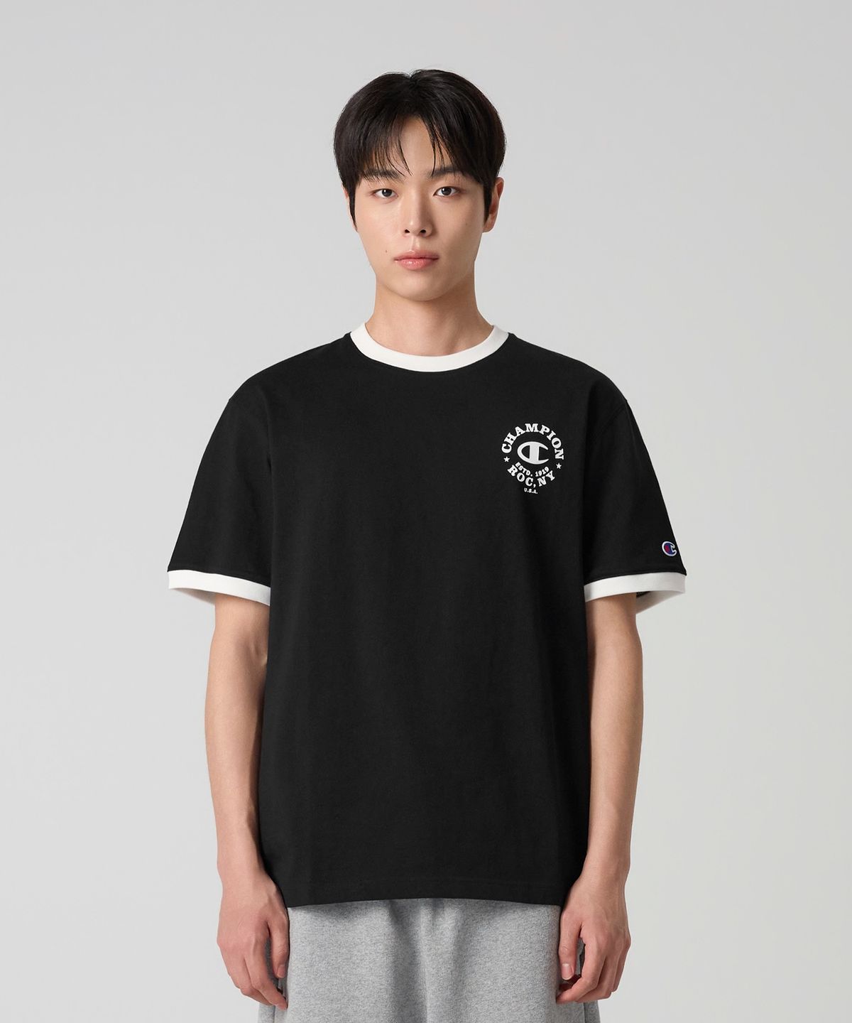 챔피온(CHAMPION) 그래픽 프린트 링거 티셔츠 Black