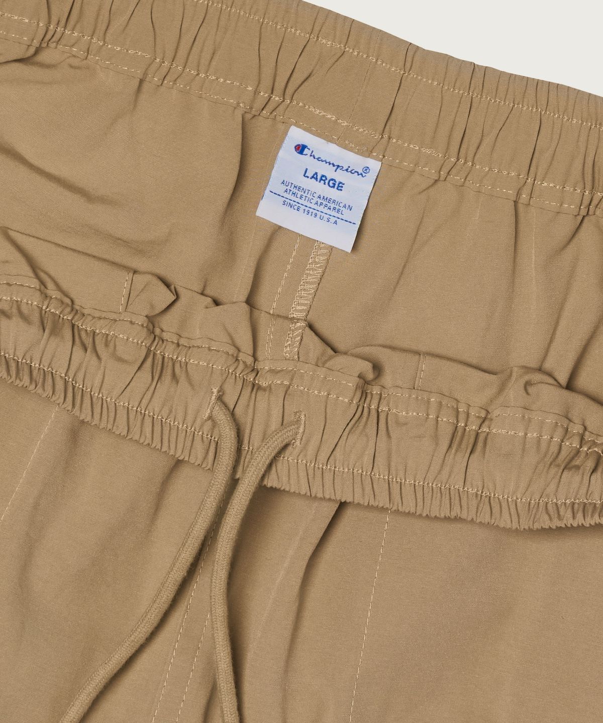 챔피온(CHAMPION) C로고 우븐 쇼츠 Beige
