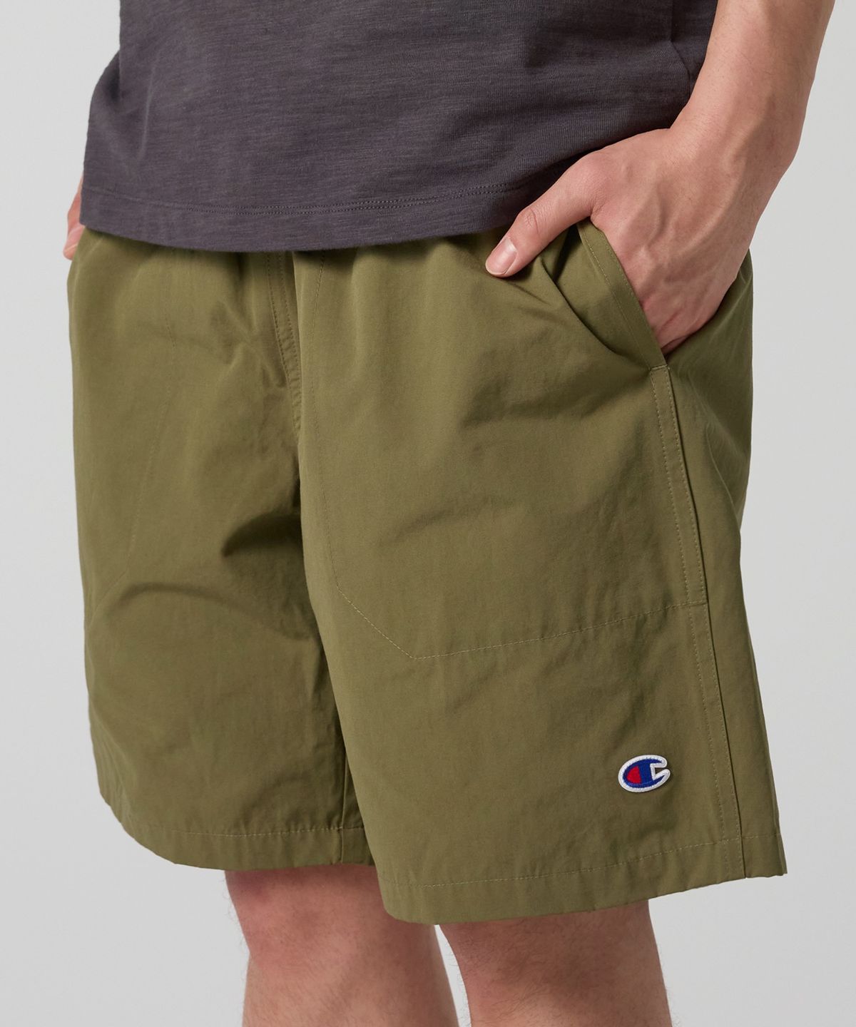 챔피온(CHAMPION) C로고 우븐 쇼츠 Khaki