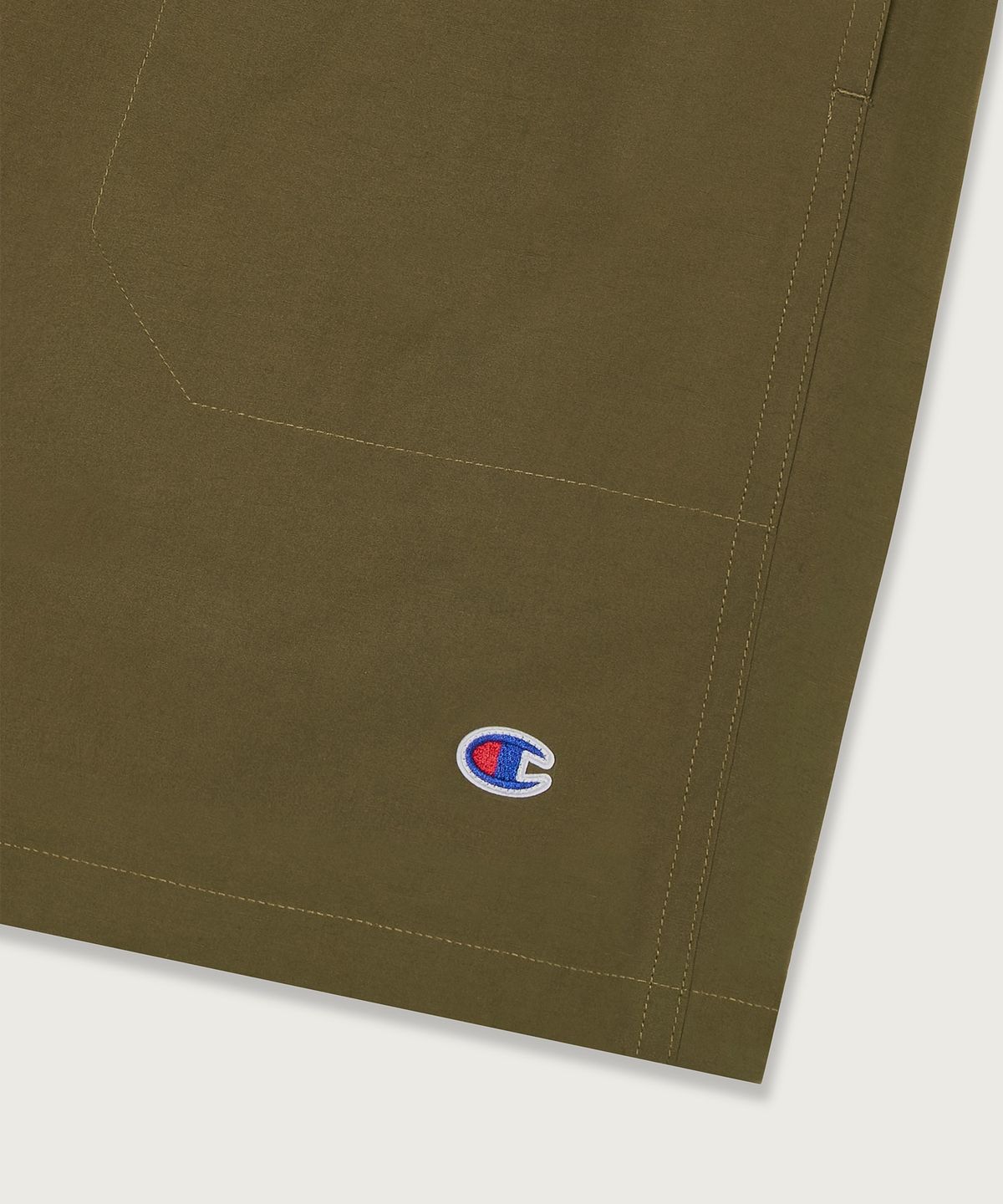 챔피온(CHAMPION) C로고 우븐 쇼츠 Khaki
