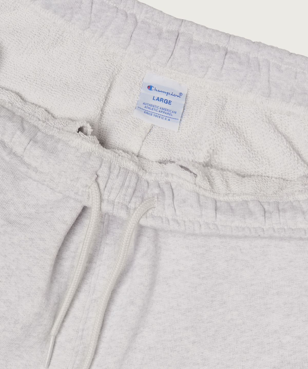 챔피온(CHAMPION) C로고 루즈핏 버뮤다 스웨트 팬츠 Light Grey