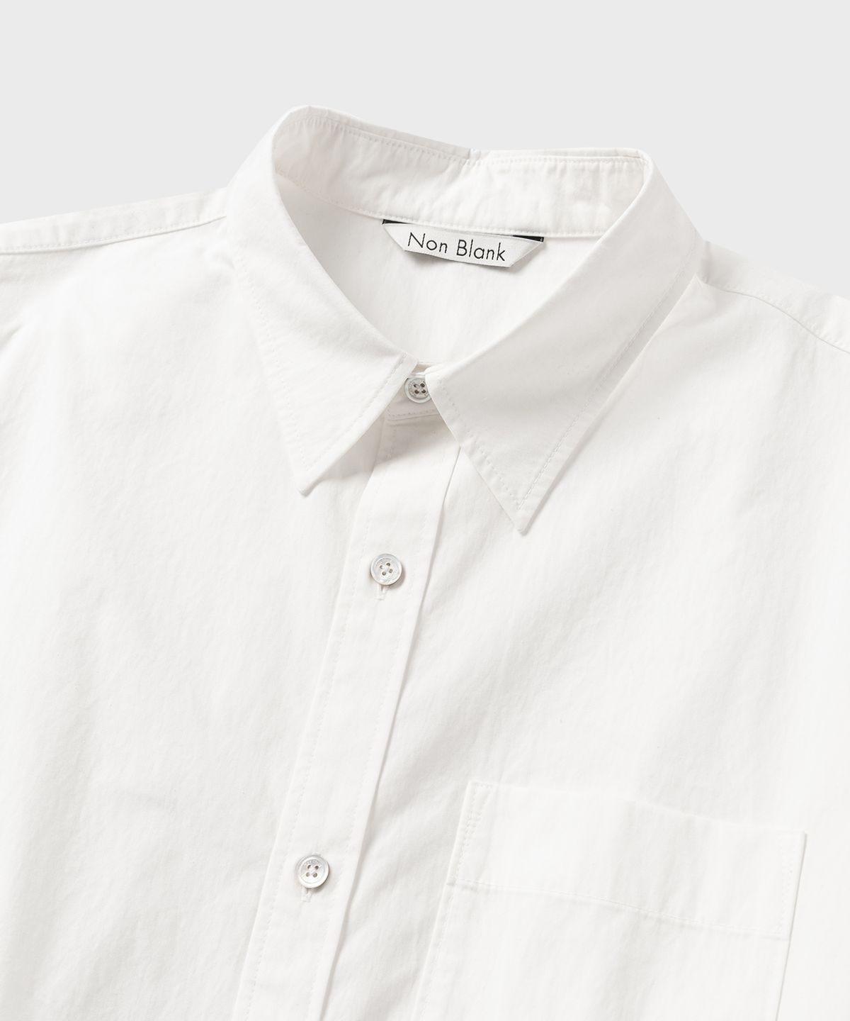 넌블랭크(NONBLANK) 소프트 크런치 CN 크롭 LS 셔츠_WHITE
