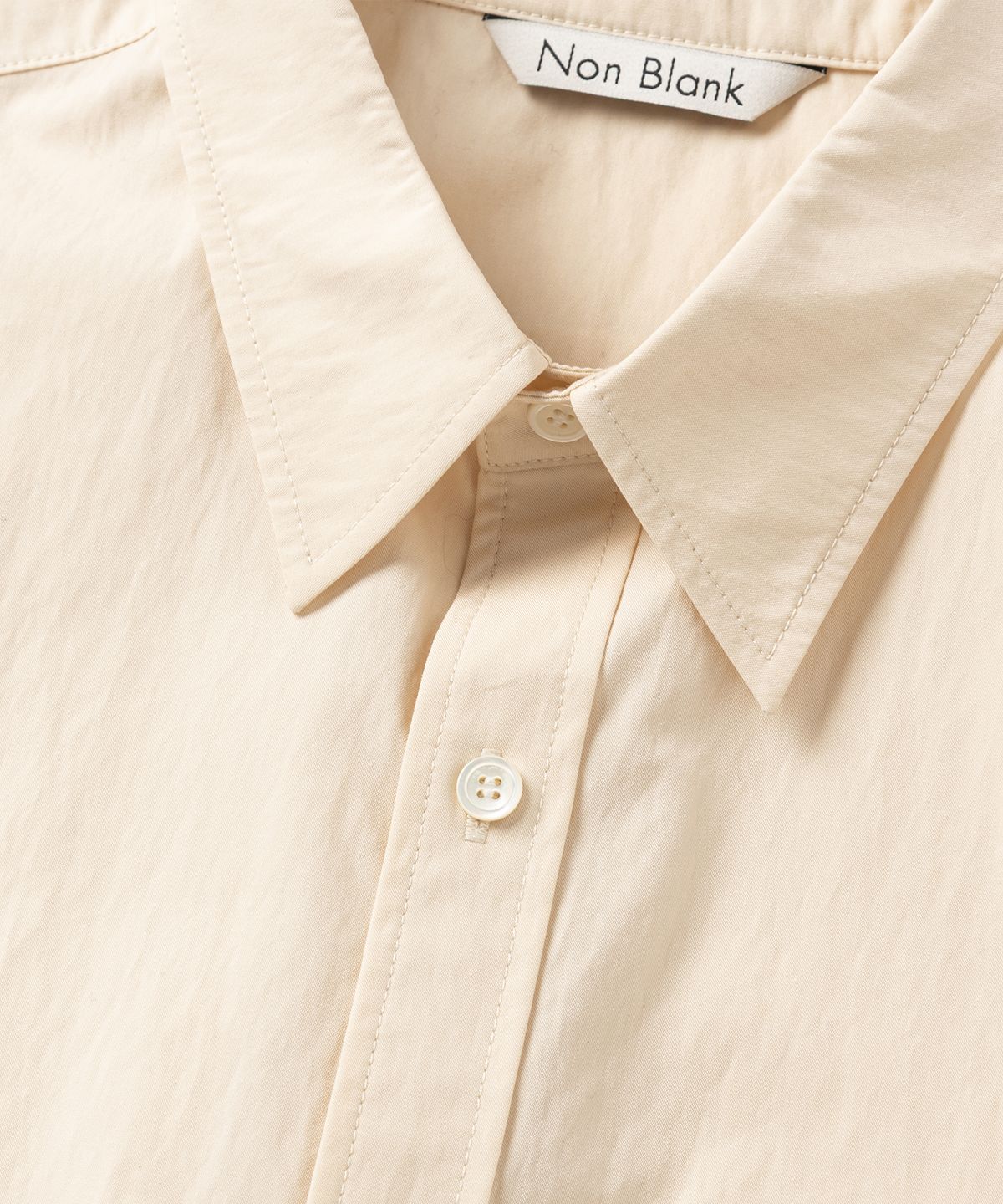 넌블랭크(NONBLANK) 소프트 크런치 CN 크롭 LS 셔츠_PALE YELLOW