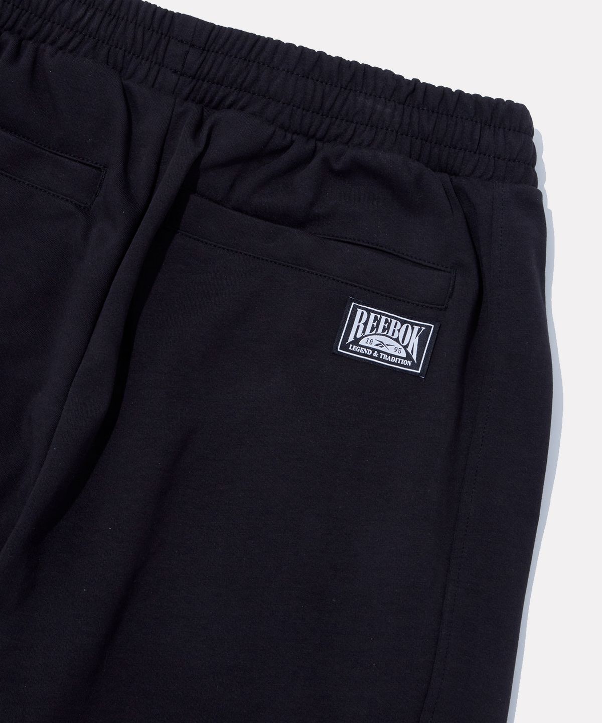 리복(REEBOK) 와이드 스웨트 조거 팬츠 - 블랙