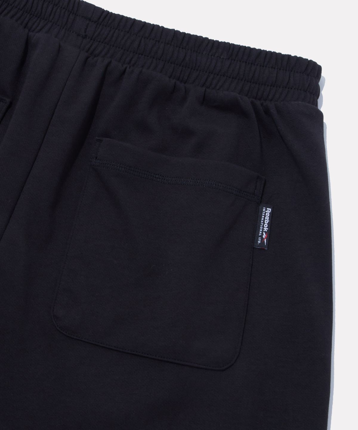 리복(REEBOK) 와이드 스웨트 버뮤다 - 블랙