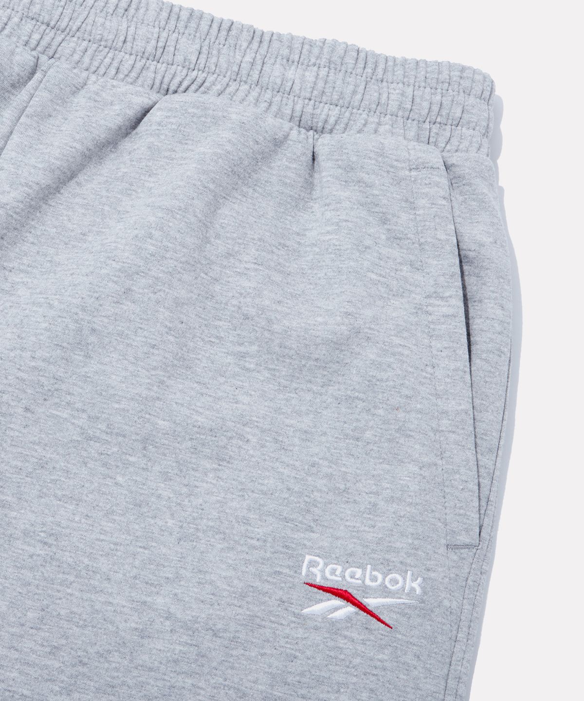 리복(REEBOK) 와이드 스웨트 버뮤다 - 멜란지 그레이