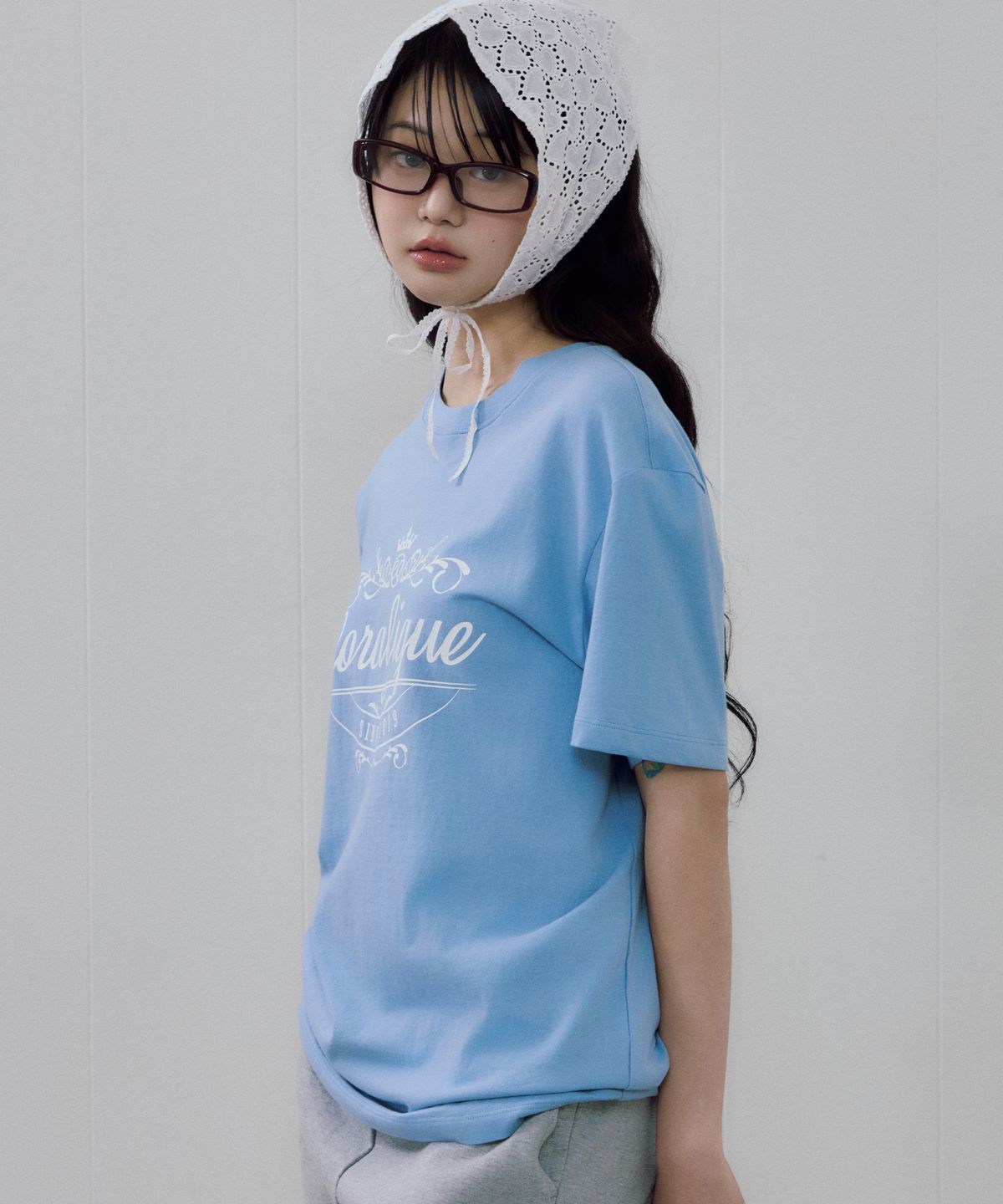 코랄리크(CORALIQUE) 아카이브 그래픽 로고 티셔츠 블루