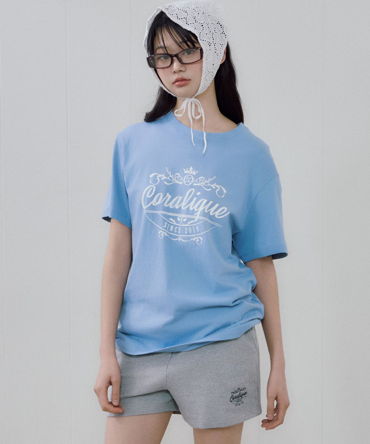 코랄리크(CORALIQUE) 아카이브 그래픽 로고 티셔츠 블루