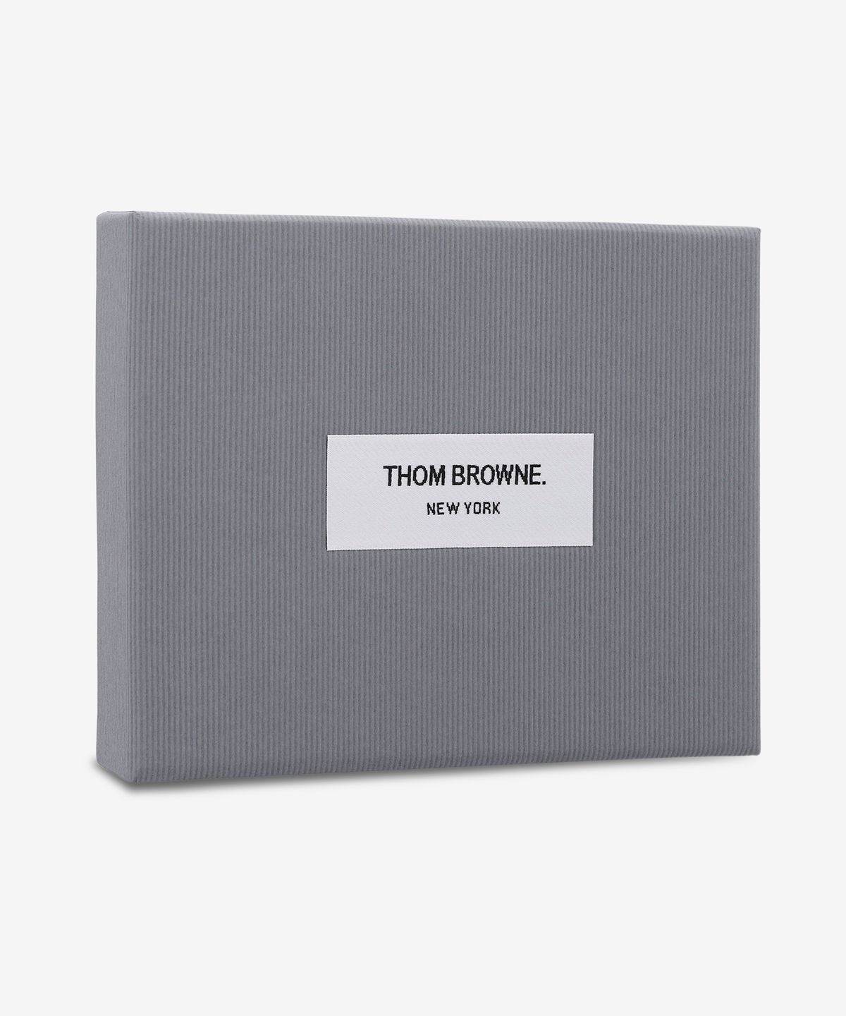 톰 브라운(THOM BROWNE) 호올스 아플리케 인 페블 싱글 카드 홀더 - 블랙 / UAW084A00198001